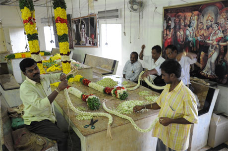 Eight special garlands for Lord Venkateswara every day Garlands of 100 feet long adorn deity 27 varities of flowers, 7 types of aromic leafs 50-100 kgs of fresh flowers every day